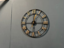 Load image into Gallery viewer, Large Black and Gold Roman Numeral Skeleton Clock