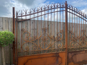Exceptional Pair of Ornate Solid Iron Gates