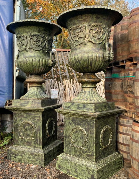 Pair of Massive Cast Iron Urns