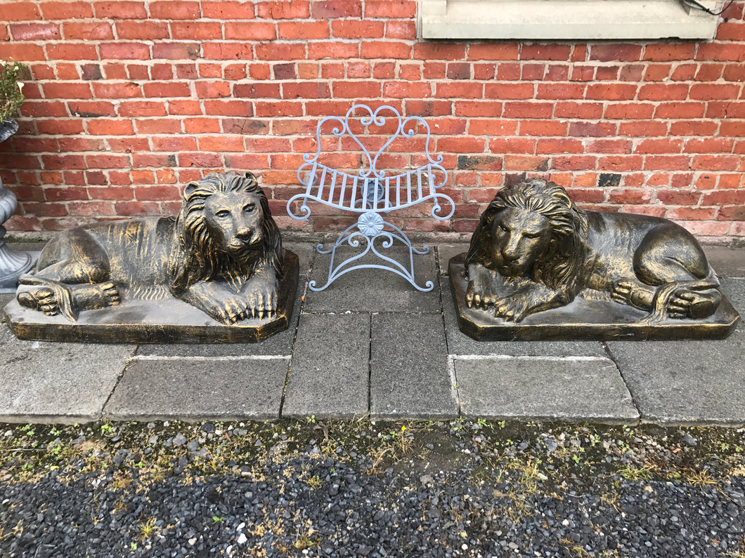 Pair of Large Laying Lions